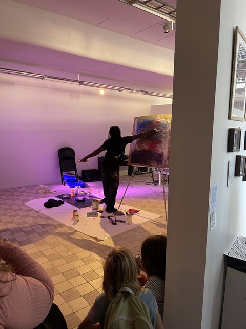 Bruce Karim painting during the first public presentation of RISE UP at Konsthall C in 2025.